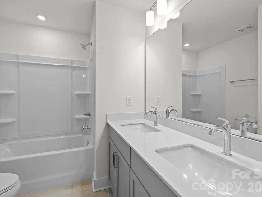 2930 Clyde Drive, Charlotte, NC 28208.  MLS# CAR4368243, YatesRealty ID 10149. Representative PhotoSecondary Bathroom with Upgrade - dual sinks