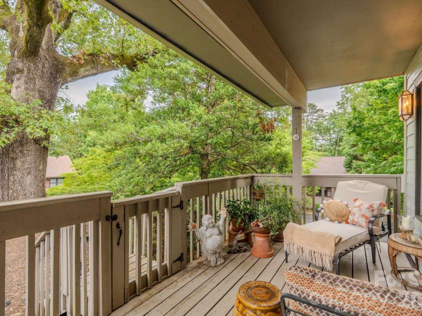 77 Chestnut Street, Tryon, NC 28782.  MLS# CAR4389953, YatesRealty ID 1015. Deck from living room