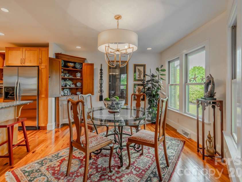 77 Chestnut Street, Tryon, NC 28782.  MLS# CAR4389953, YatesRealty ID 1015. Dining area / open concept
