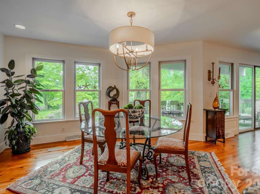77 Chestnut Street, Tryon, NC 28782.  MLS# CAR4389953, YatesRealty ID 1015. Dining Area overlooking greenspace