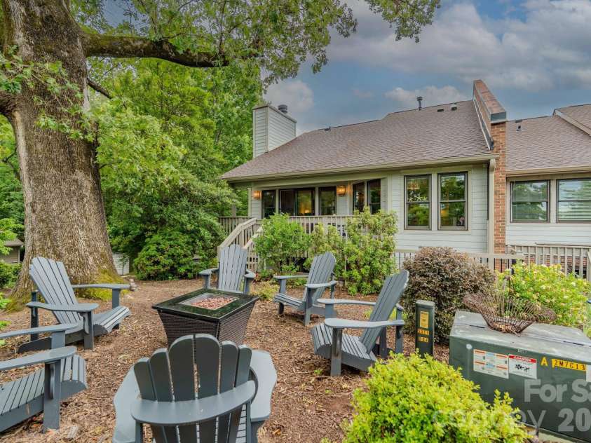 77 Chestnut Street, Tryon, NC 28782.  MLS# CAR4389953, YatesRealty ID 1015. Firepit