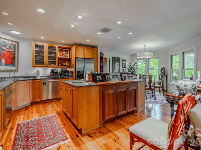 77 Chestnut Street, Tryon, NC 28782.  MLS# CAR4389953, YatesRealty ID 1015. Kitchen with island and custom cabinetry