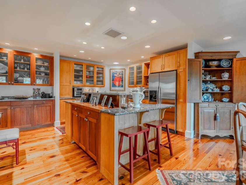 77 Chestnut Street, Tryon, NC 28782.  MLS# CAR4389953, YatesRealty ID 1015. Kitchen with island / open concept
