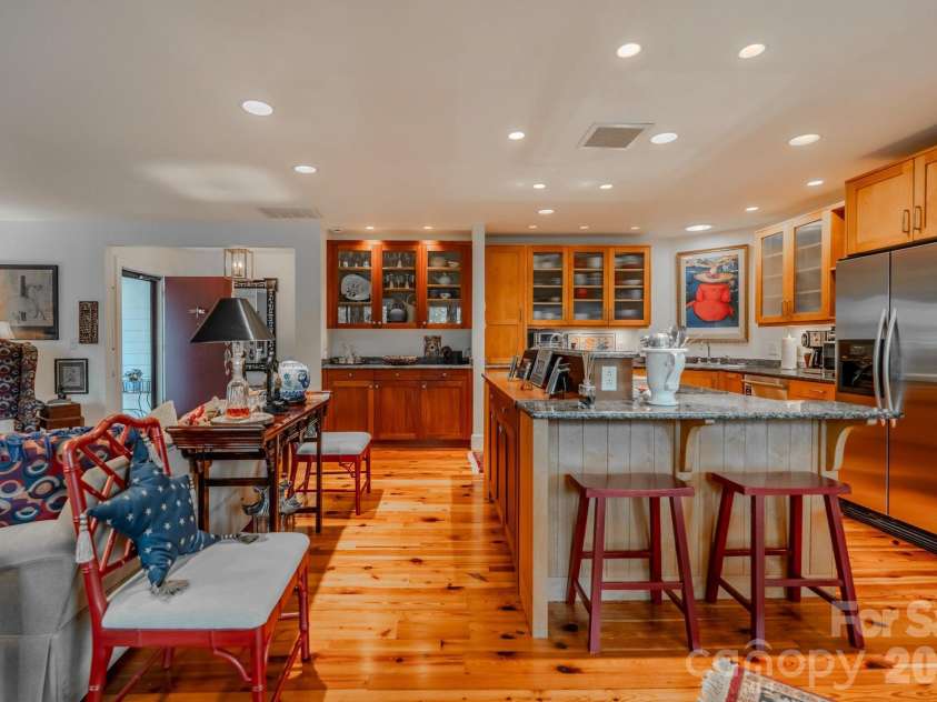 77 Chestnut Street, Tryon, NC 28782.  MLS# CAR4389953, YatesRealty ID 1015. Kitchen/Living Room/Dining area