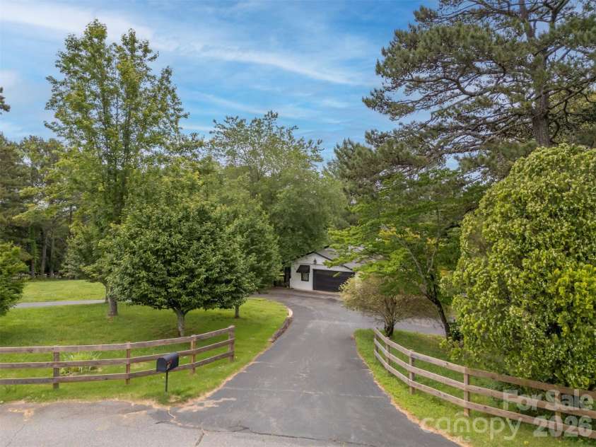 64 Persimmon Hill Drive, Columbus, NC 28722.  MLS# CAR4350872, YatesRealty ID 10156. Driveway