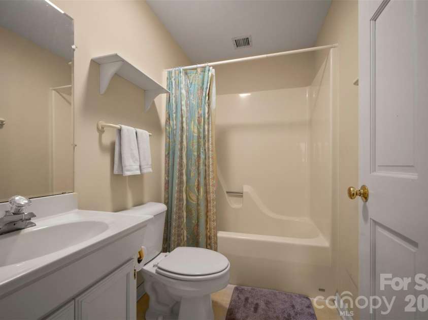 64 Persimmon Hill Drive, Columbus, NC 28722.  MLS# CAR4350872, YatesRealty ID 10156. Guest Cottage Bath