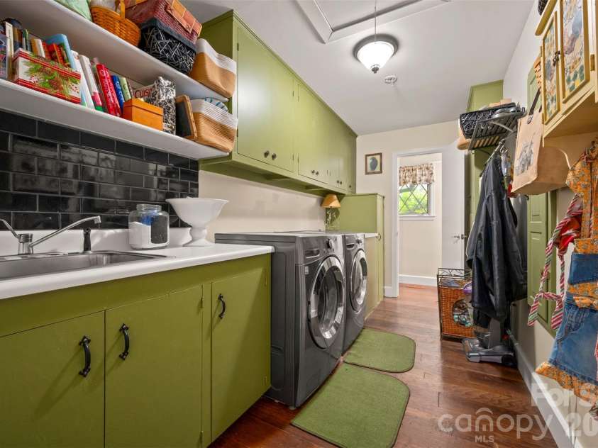 64 Persimmon Hill Drive, Columbus, NC 28722.  MLS# CAR4350872, YatesRealty ID 10156. Laundry Room with Half Bathroom