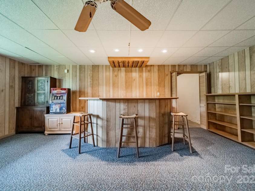 807 and 809 Sparrow Springs Road, Kings Mountain, NC 28086.  MLS# CAR4240864, YatesRealty ID 10158. Lower Level Bar