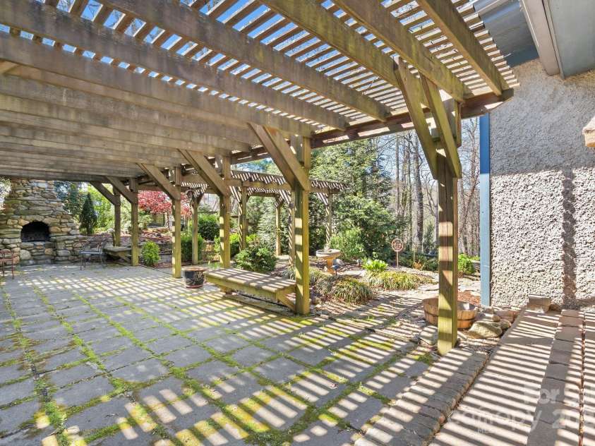 111 Flora Rose Trail, Asheville, NC 28803.  MLS# CAR4239614, YatesRealty ID 10160. Zoom in on the fireplace