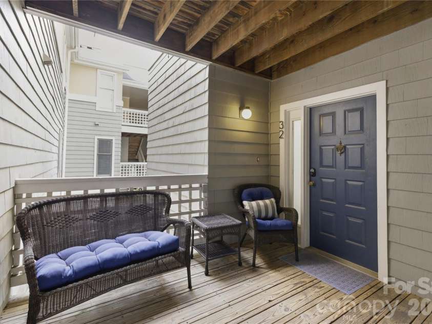 308 Queens Road, Charlotte, NC 28204.  MLS# CAR4367696, YatesRealty ID 10165. Front balcony sitting area