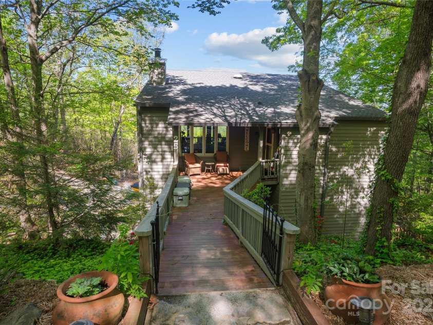 25 Little Falls Drive, Tryon, NC 28782.  MLS# CAR4253807, YatesRealty ID 10167. 