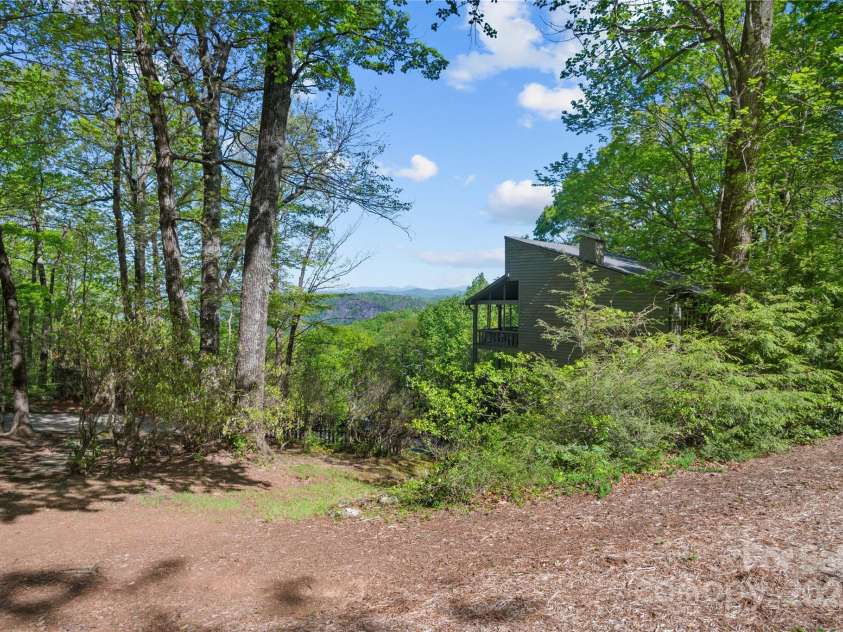 25 Little Falls Drive, Tryon, NC 28782.  MLS# CAR4253807, YatesRealty ID 10167. 