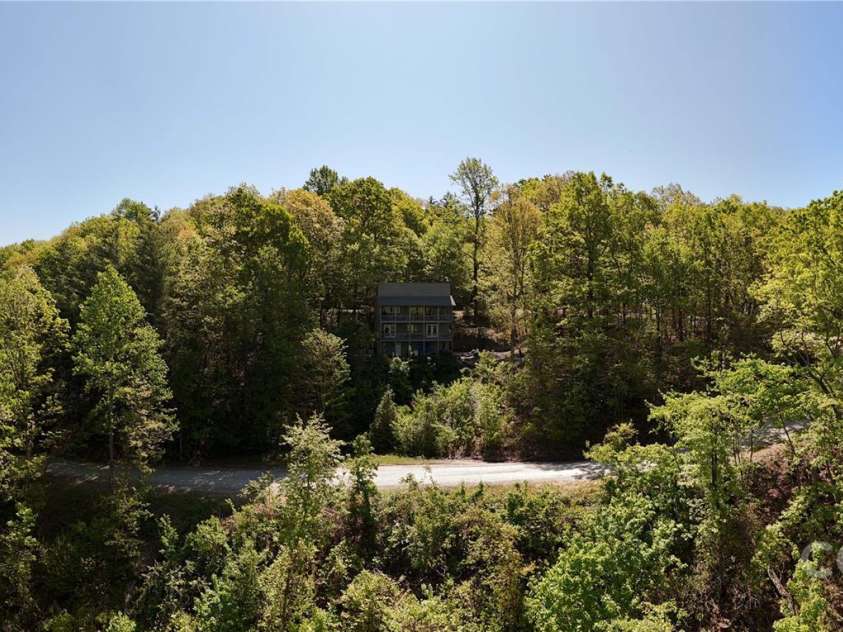 25 Little Falls Drive, Tryon, NC 28782.  MLS# CAR4253807, YatesRealty ID 10167. 