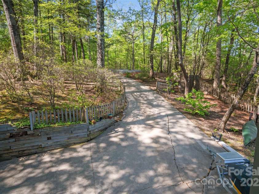 25 Little Falls Drive, Tryon, NC 28782.  MLS# CAR4253807, YatesRealty ID 10167. 