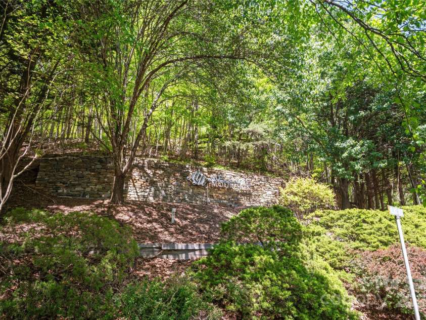 25 Little Falls Drive, Tryon, NC 28782.  MLS# CAR4253807, YatesRealty ID 10167. 