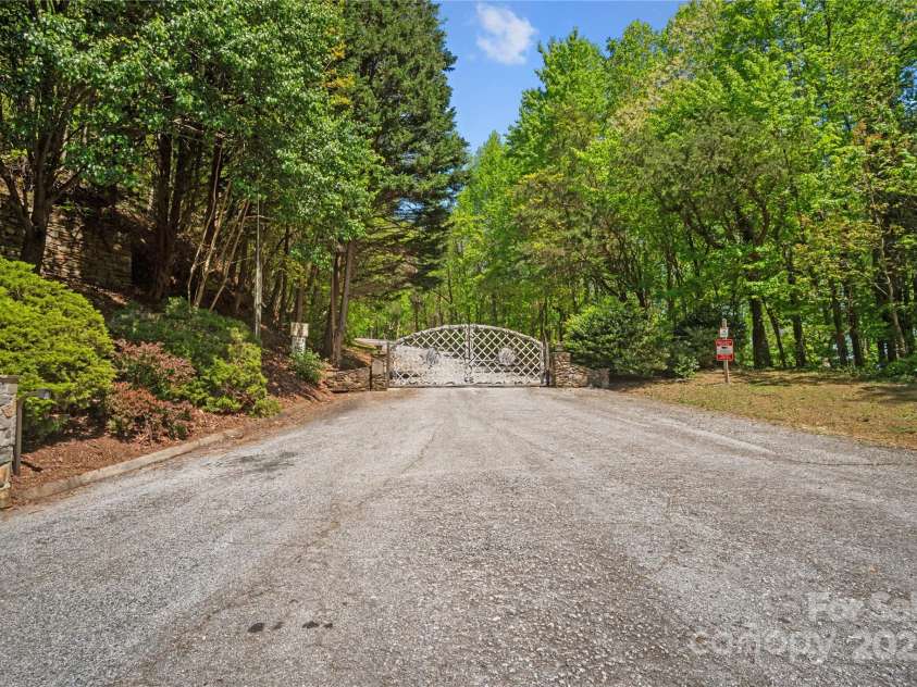 25 Little Falls Drive, Tryon, NC 28782.  MLS# CAR4253807, YatesRealty ID 10167. 