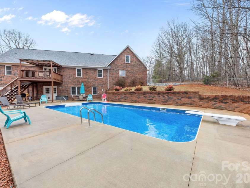 3156 Teresa Drive, Lincolnton, NC 28092.  MLS# CAR4350524, YatesRealty ID 10169. Salt water pool