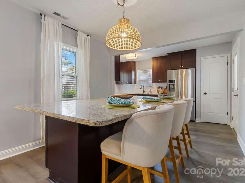 1509 Harrill Street, Charlotte, NC 28205.  MLS# CAR4280930, YatesRealty ID 10170. Oversized island for dining and entertaining