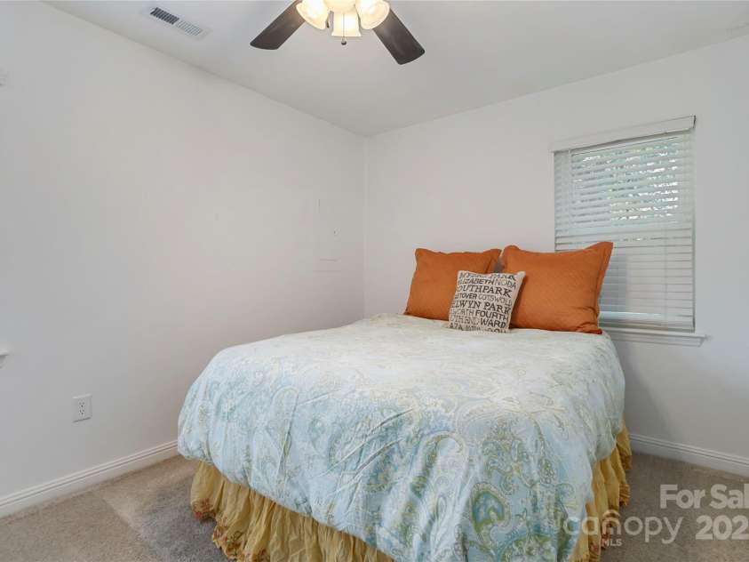 1509 Harrill Street, Charlotte, NC 28205.  MLS# CAR4280930, YatesRealty ID 10170. Primary bedroom 3 with en suite half bath