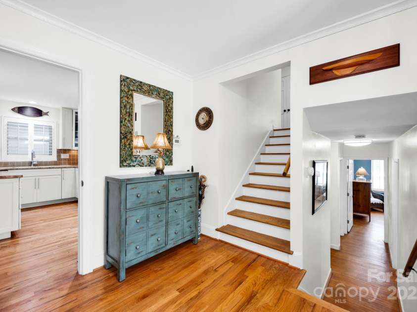 4937 Broken Saddle Lane, Charlotte, NC 28226.  MLS# CAR4244000, YatesRealty ID 10175. Foyer with view to kitchen and stairs.