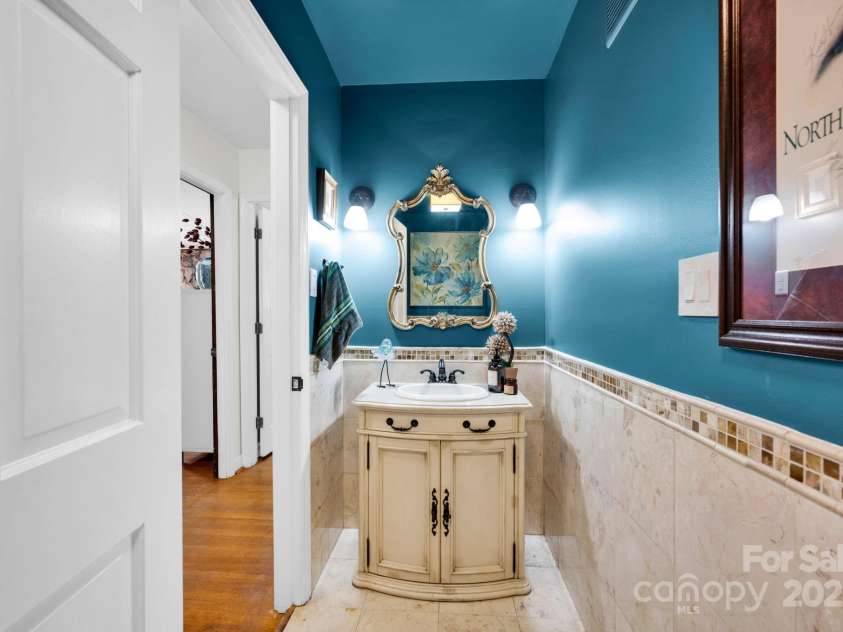 4937 Broken Saddle Lane, Charlotte, NC 28226.  MLS# CAR4244000, YatesRealty ID 10175. Half bath on lower level.