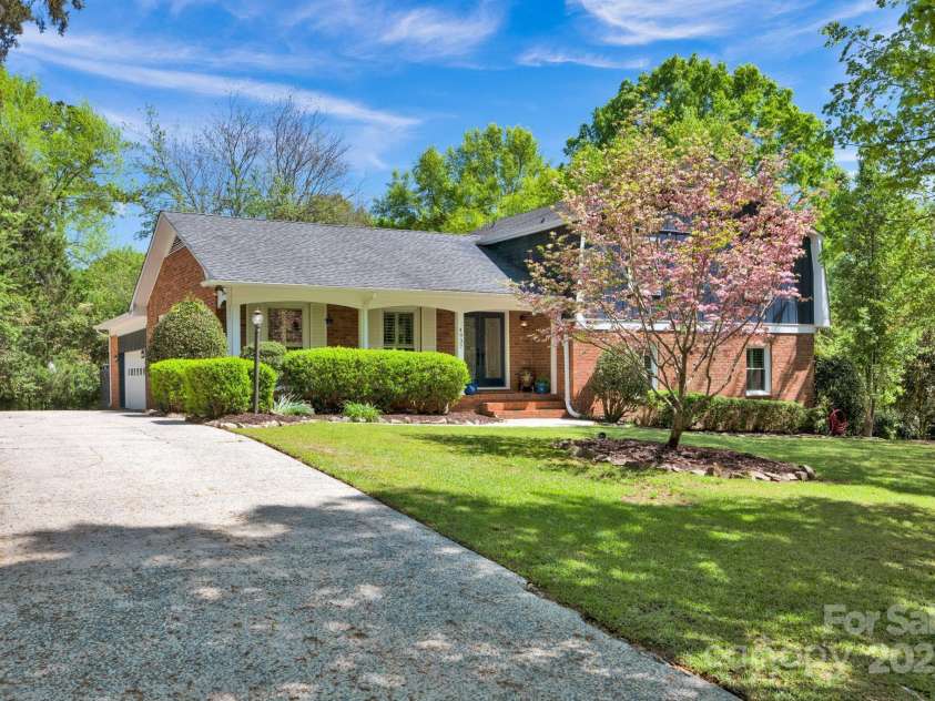 4937 Broken Saddle Lane, Charlotte, NC 28226.  MLS# CAR4244000, YatesRealty ID 10175. Side load 2 car garage at the rear of the home.