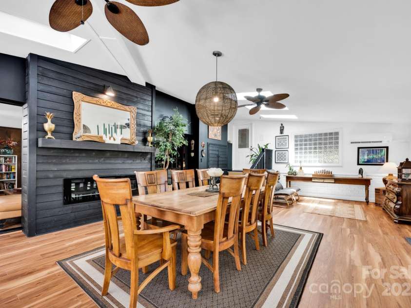 4937 Broken Saddle Lane, Charlotte, NC 28226.  MLS# CAR4244000, YatesRealty ID 10175. View to family room and door to the garage and kitchen.