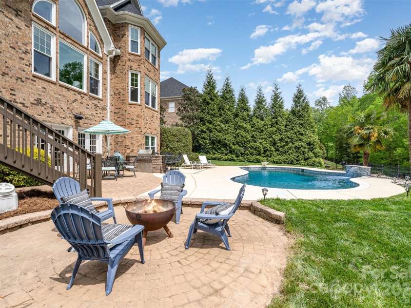 3306 Delamere Drive, Matthews, NC 28104.  MLS# CAR4247095, YatesRealty ID 10176. Fire pit area