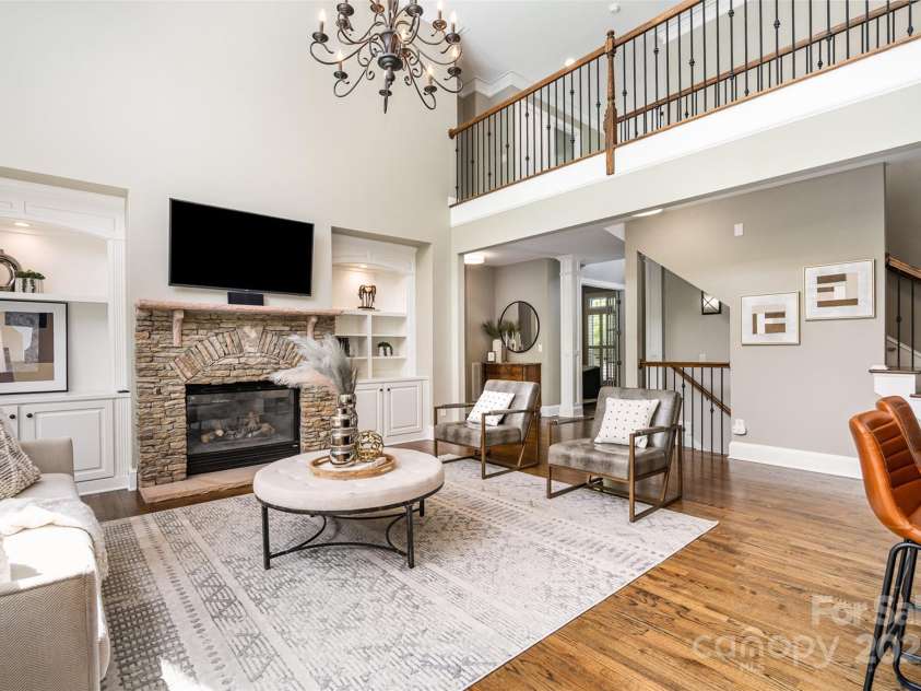 3306 Delamere Drive, Matthews, NC 28104.  MLS# CAR4247095, YatesRealty ID 10176. Great room fire place feature