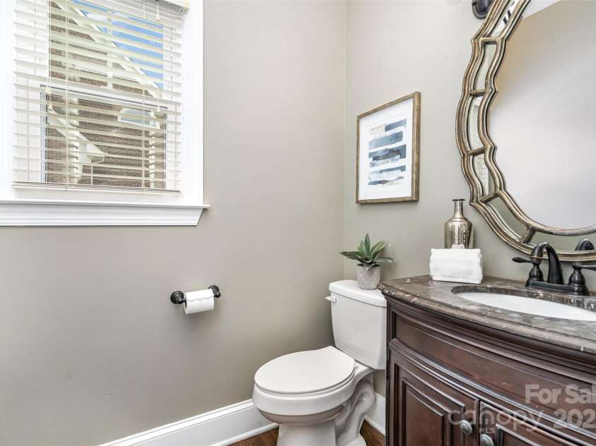 3306 Delamere Drive, Matthews, NC 28104.  MLS# CAR4247095, YatesRealty ID 10176. Half bathroom on main level