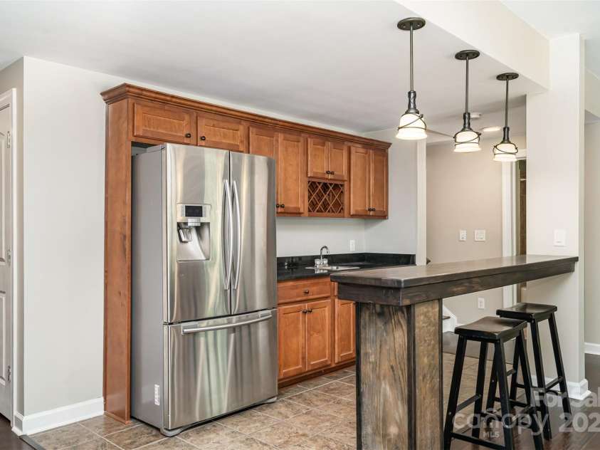 3306 Delamere Drive, Matthews, NC 28104.  MLS# CAR4247095, YatesRealty ID 10176. Kitchenette/wetbar