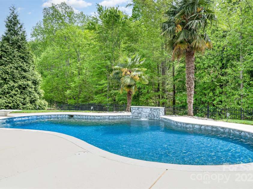 3306 Delamere Drive, Matthews, NC 28104.  MLS# CAR4247095, YatesRealty ID 10176. Waterfall feature
