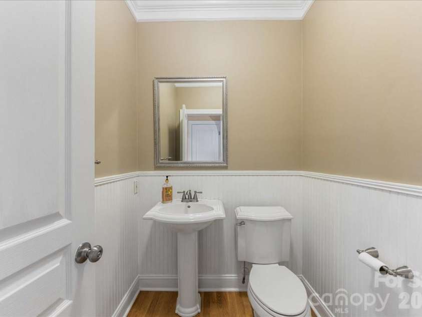 8380 Rocky River Road, Harrisburg, NC 28075.  MLS# CAR4359781, YatesRealty ID 10177. Half bath