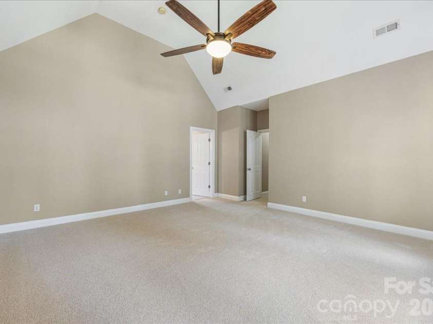 8380 Rocky River Road, Harrisburg, NC 28075.  MLS# CAR4359781, YatesRealty ID 10177. Primary bedroom