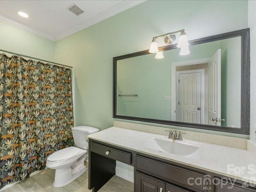 8380 Rocky River Road, Harrisburg, NC 28075.  MLS# CAR4359781, YatesRealty ID 10177. Rear patio
