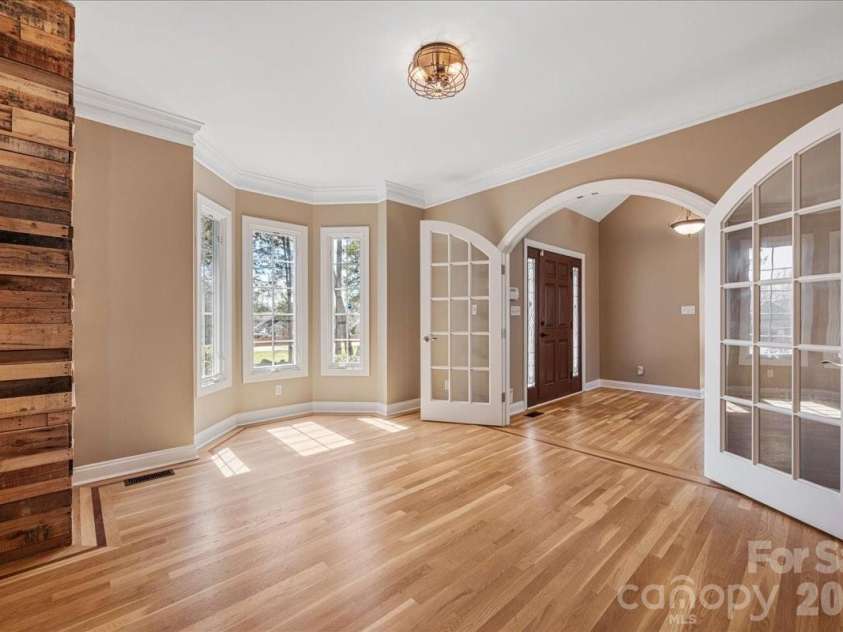 8380 Rocky River Road, Harrisburg, NC 28075.  MLS# CAR4359781, YatesRealty ID 10177. Study or formal dining room