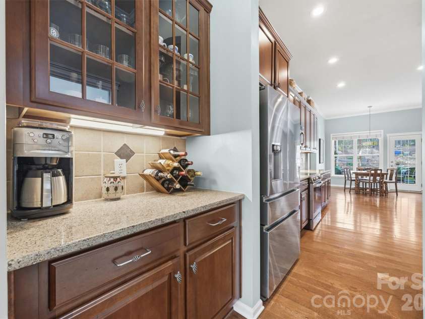 1132 Aringill Lane, Matthews, NC 28104.  MLS# CAR4361071, YatesRealty ID 10178. Butler's pantry between kitchen and dining room.