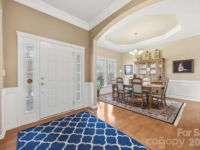 1132 Aringill Lane, Matthews, NC 28104.  MLS# CAR4361071, YatesRealty ID 10178. Dining room with tray ceiling.