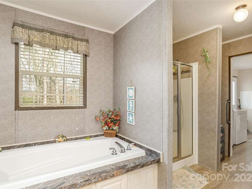 471 Pleasant Grove Road, Hendersonville, NC 28739.  MLS# CAR4243526, YatesRealty ID 10179. 