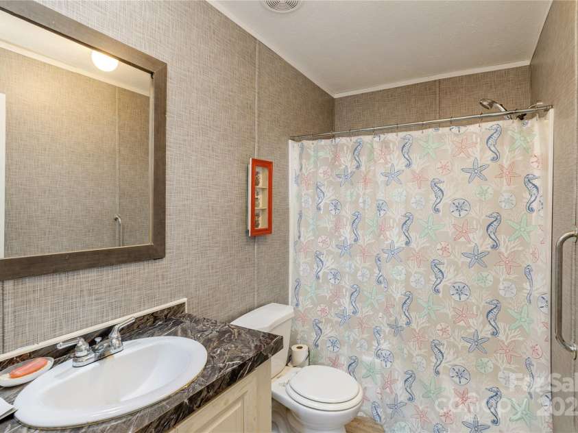 471 Pleasant Grove Road, Hendersonville, NC 28739.  MLS# CAR4243526, YatesRealty ID 10179. 