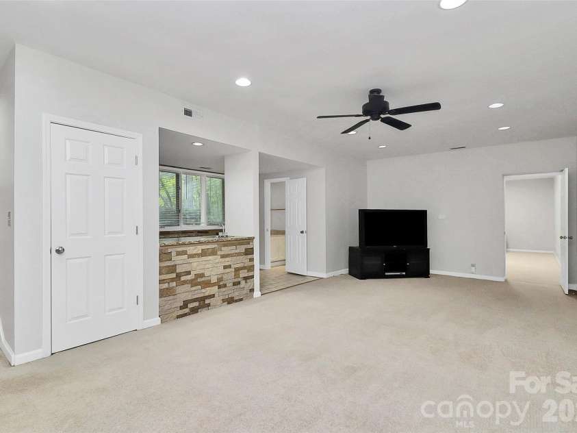 16 Woodvine Lane, Clover, SC 29710.  MLS# CAR4303329, YatesRealty ID 10180. Lower Level Great Room
