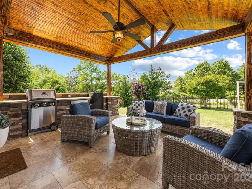 487 Hawks Creek Parkway, Fort Mill, SC 29708.  MLS# CAR4246089, YatesRealty ID 10180. Back patio w/ kitchen