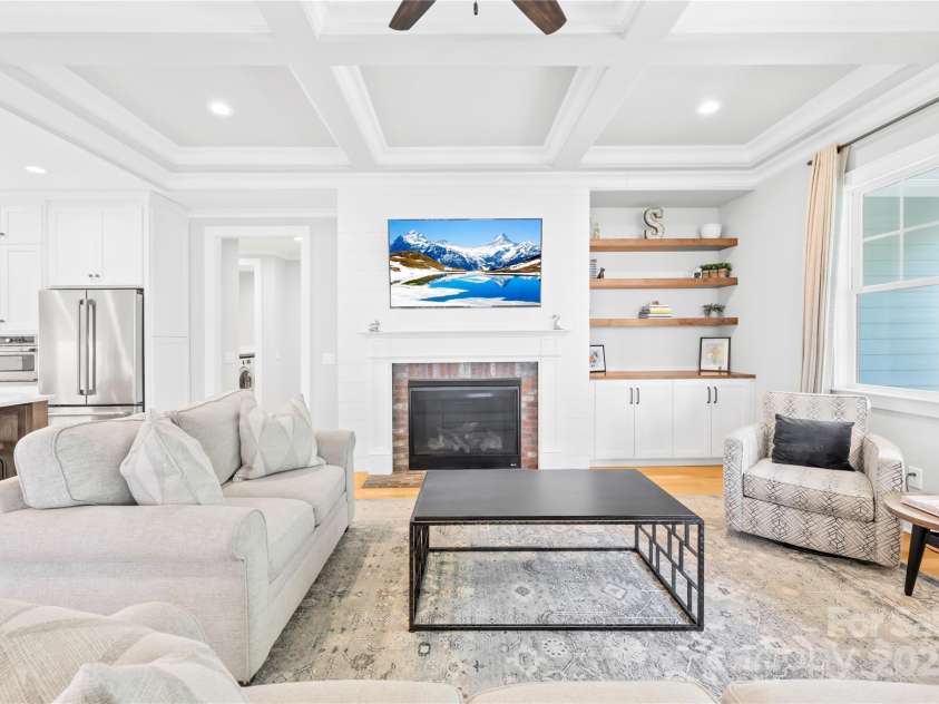 108 Castleview Lane, Mooresville, NC 28115.  MLS# CAR4246453, YatesRealty ID 10181. Custom builtins and vented gas fireplace