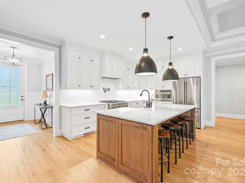 108 Castleview Lane, Mooresville, NC 28115.  MLS# CAR4246453, YatesRealty ID 10181. Rich wooden island
