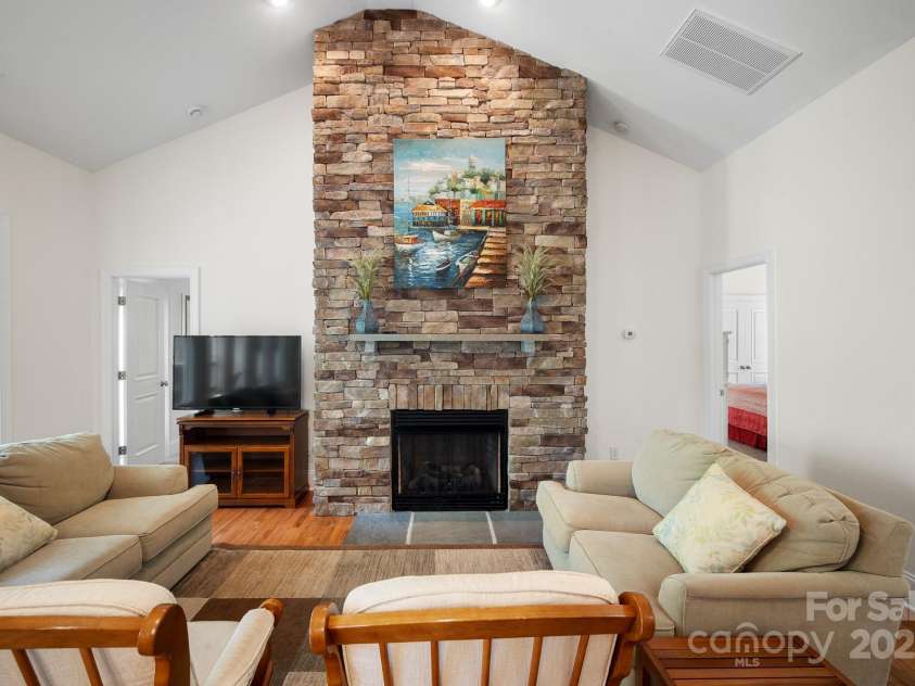 591 Emerald Isle Court, Lexington, NC 27292.  MLS# CAR4245365, YatesRealty ID 10185. Fireplace in living room