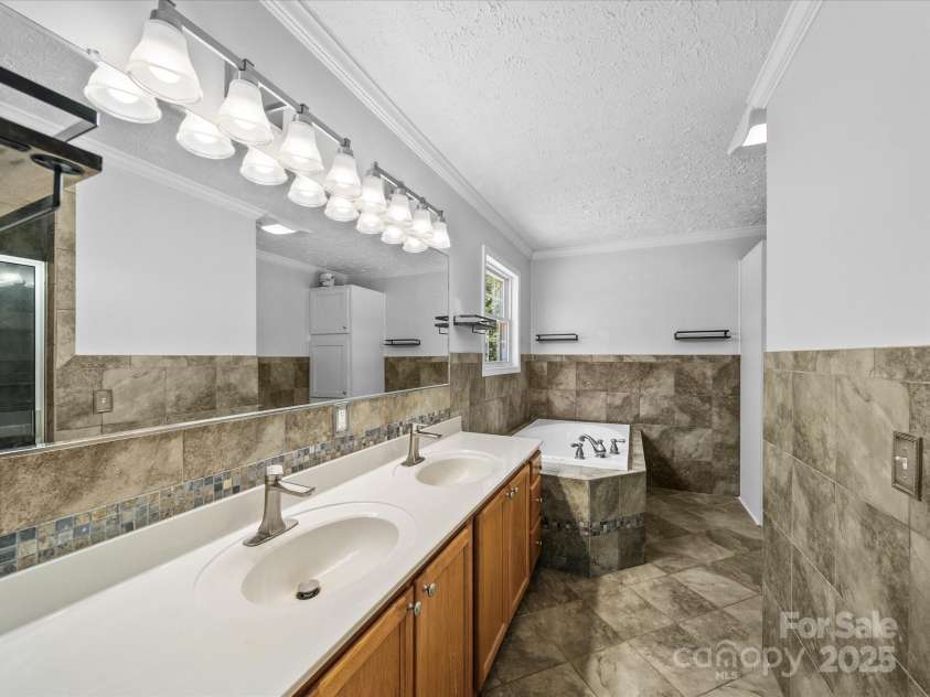 3546 Mount Pleasant Road, Concord, NC 28025.  MLS# CAR4247028, YatesRealty ID 10192. Primary bath