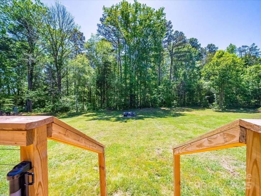 3546 Mount Pleasant Road, Concord, NC 28025.  MLS# CAR4247028, YatesRealty ID 10192. View from deck to back yard
