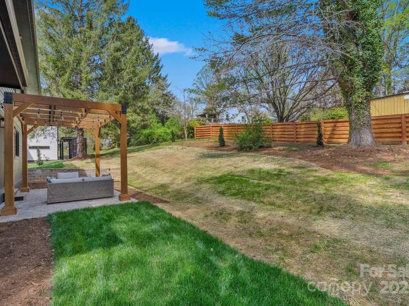 512 Tenth Street, Black Mountain, NC 28711.  MLS# CAR4247173, YatesRealty ID 10193. Gently Sloping Yard