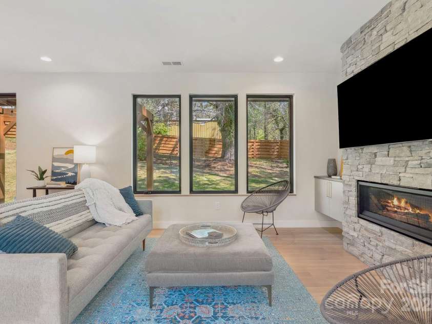 512 Tenth Street, Black Mountain, NC 28711.  MLS# CAR4247173, YatesRealty ID 10193. Large Picture Window Overlooks Back Yard