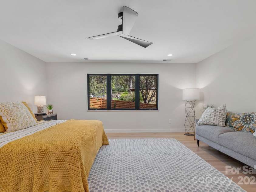 512 Tenth Street, Black Mountain, NC 28711.  MLS# CAR4247173, YatesRealty ID 10193. Picture Window Overlooks Backyard